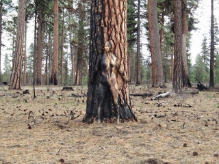 Illustration for article titled People turn invisible in these awesome body paint photographs (NSFW)